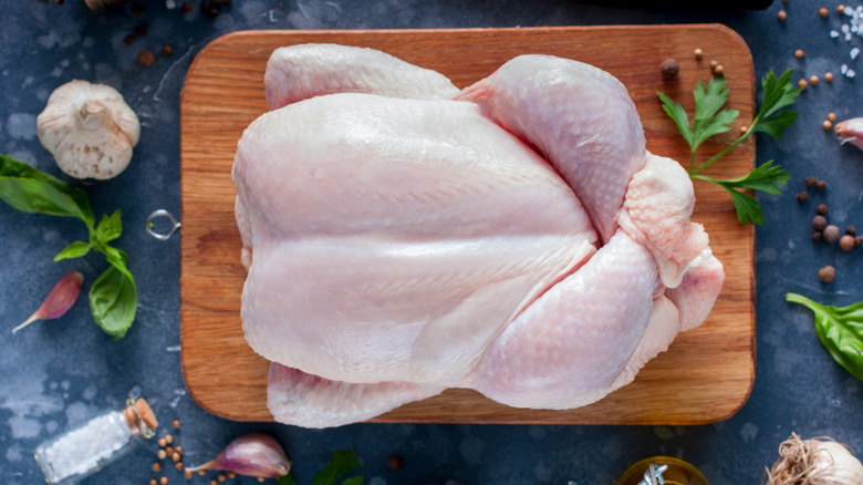raw turkey on a cutting board