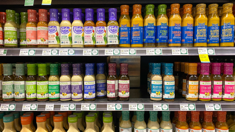 Rows of salad dressing in store