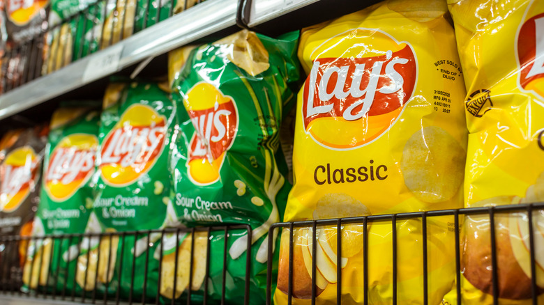 Bags of Lay's chips on shelf