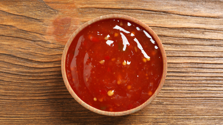 bowl of sweet and sour sauce 