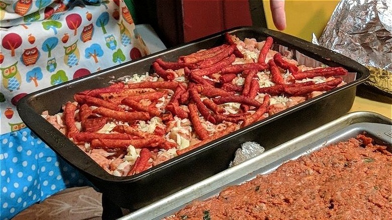 A casserole topped with Takis