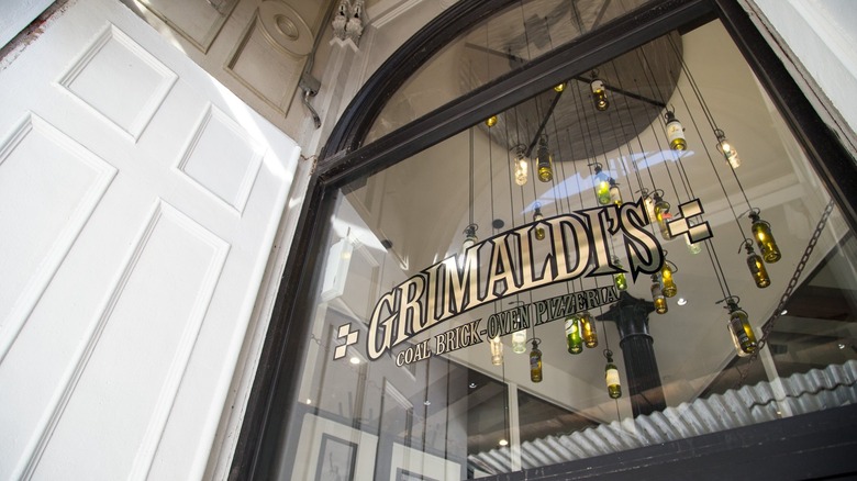 Grimaldi's front window and chandelier