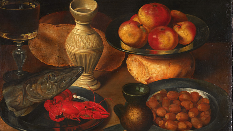 German still life painting of seafood and fruits on a table