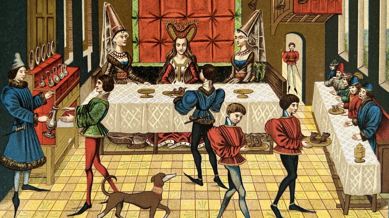 Illustration of a Medieval banquet scene in a noble's hall