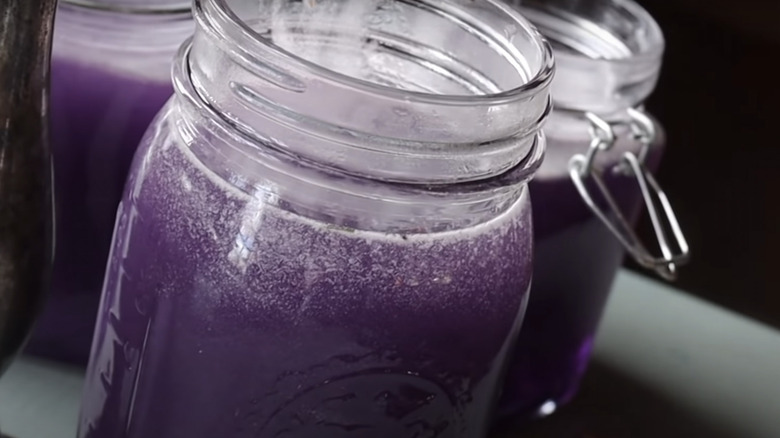 Jars of freshly made violet syrup