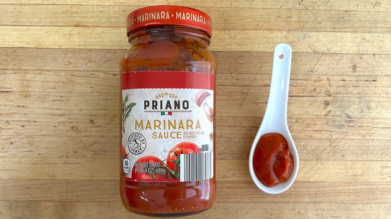 Jar and spoonful of Priano Marinara Sauce