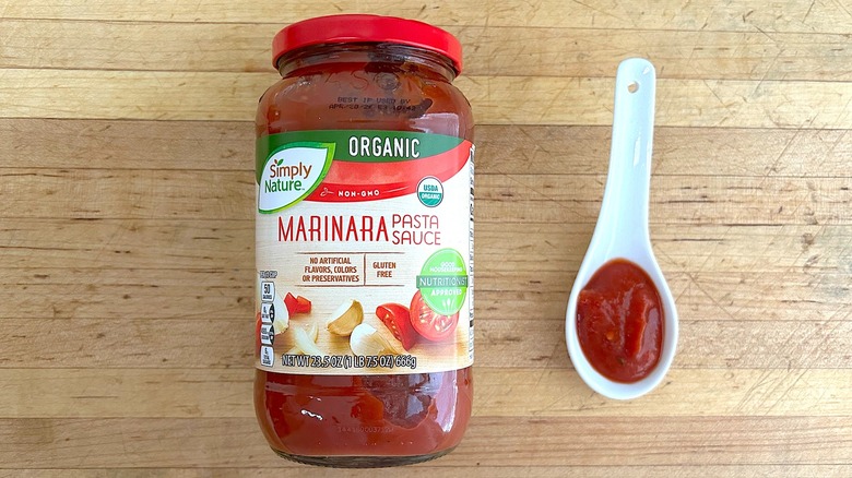 Jar and spoonful of Simply Nature Organic Marinara Pasta Sauce