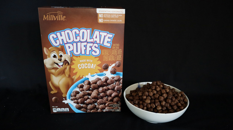 Chocolate Puffs box next to a bowl of cereal.