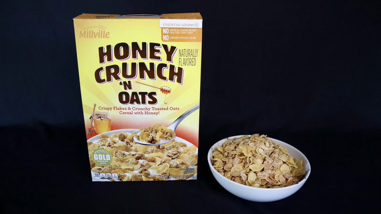 Honey Crunch 'n Oats box next to a bowl of cereal.