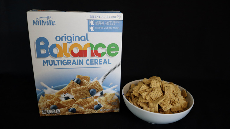 Original Balance Multigrain Cereal box next to a bowl of cereal.