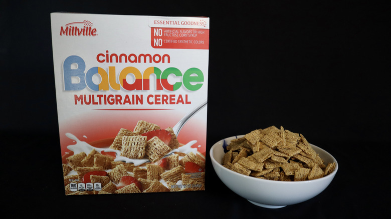 Cinnamon Balance Multigrain Cereal box next to a bowl of cereal.