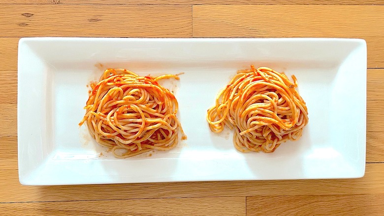 Cooked spaghetti with marinara sauce