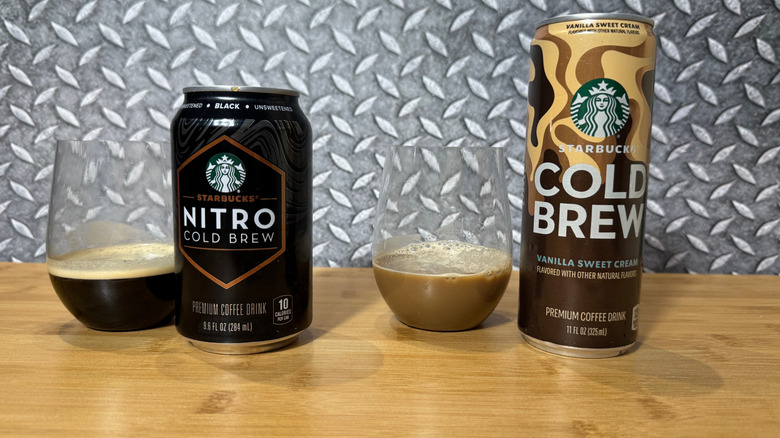 Two cans and glasses of Starbucks coffee