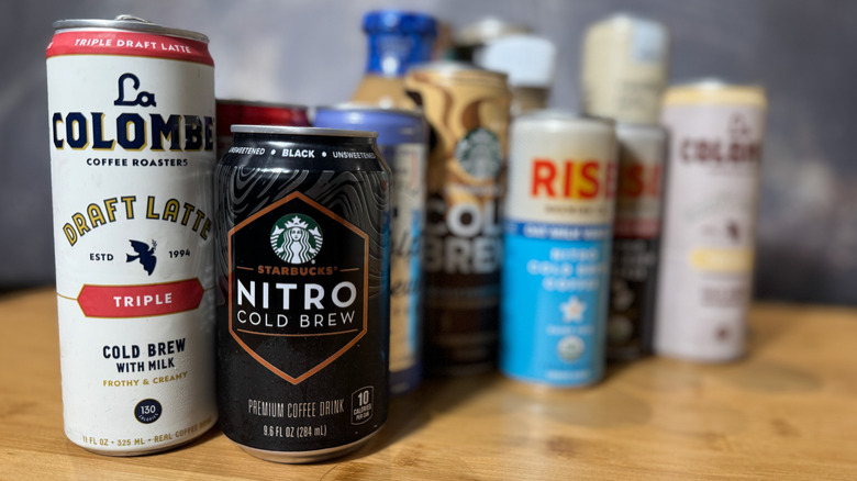 Various cans and bottles of coffee