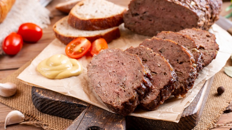 Slices of meatloaf on board