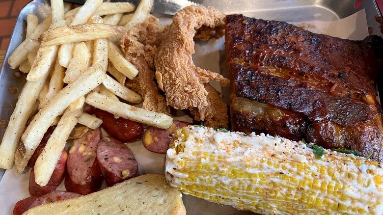 Chili's ribs, fries, tenders, and corn