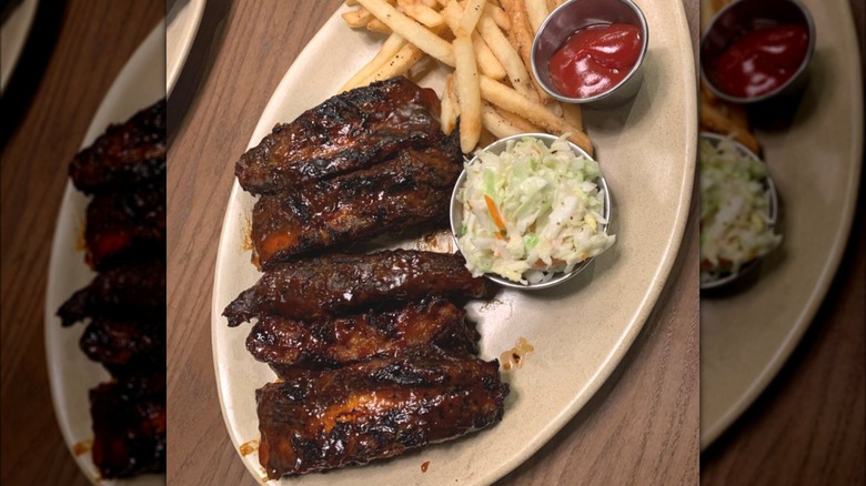 Tony Roma's ribs, fries, and coleslaw