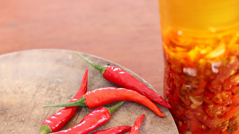 Chilis and container of chili oil