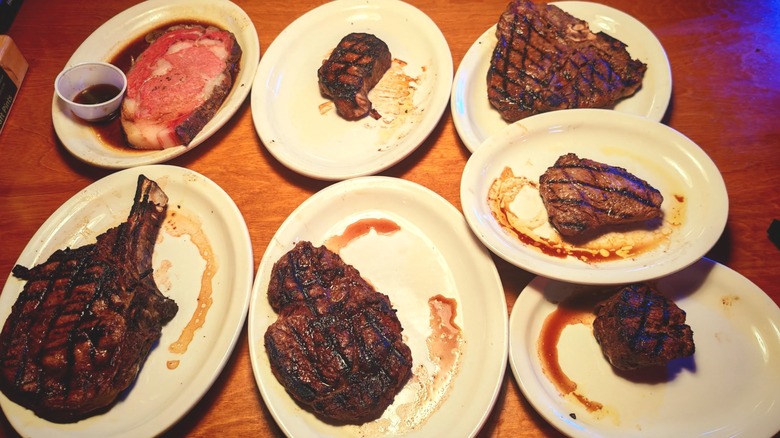 Seven individually plated Texas Roadhouse steaks