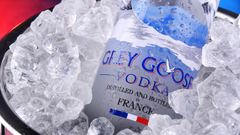 Grey Goose vodka bottle in ice
