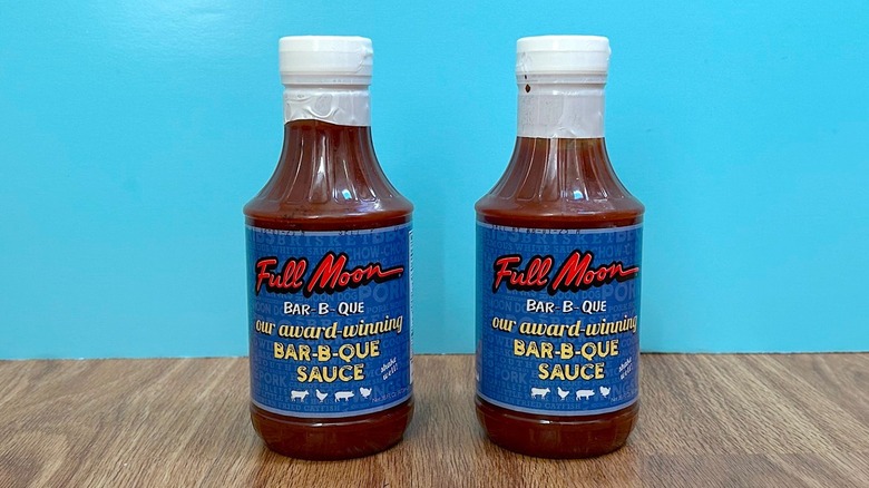 Two bottles of Full Moon BBQ Sauce