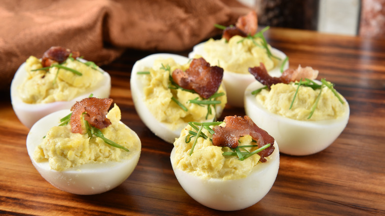 deviled eggs with chives and bacon