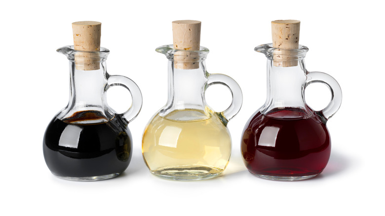 Three bottles of different vinegars