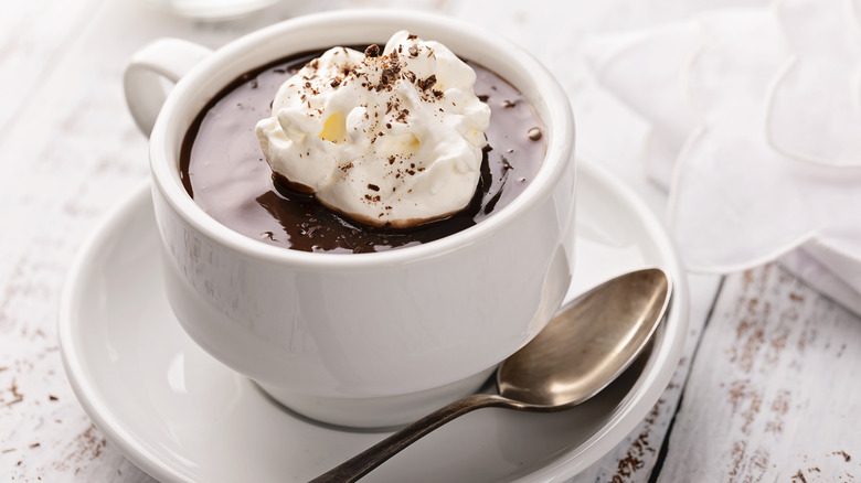 Hot chocolate with cream topping.