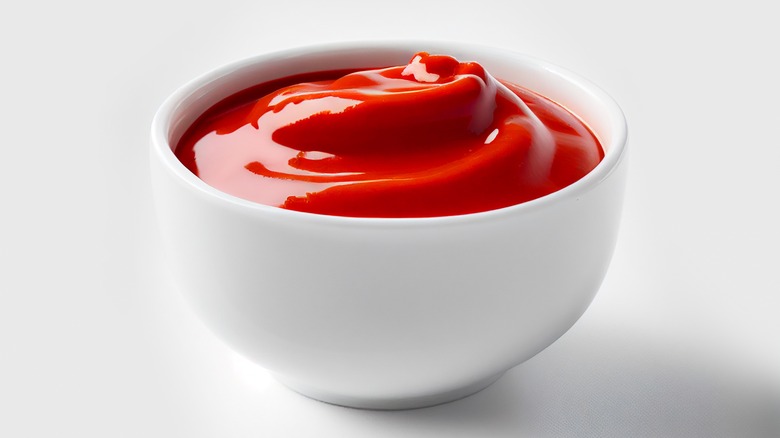 Ketchup in white bowl