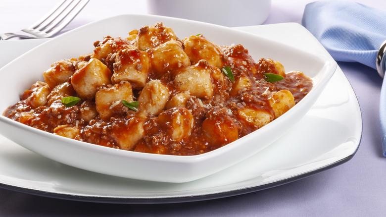 gnocchi with red sauce white bowl