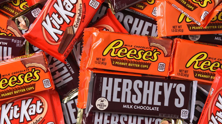 Candy bars made by Hershey in a pile