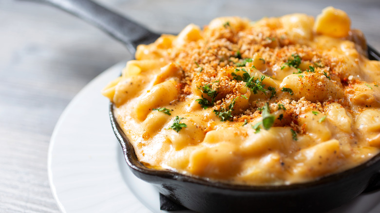 Creamy mac and cheese in a cast iron pan