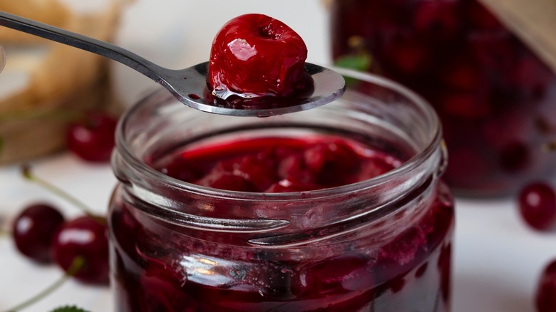 Preserved cherry jar with spoon