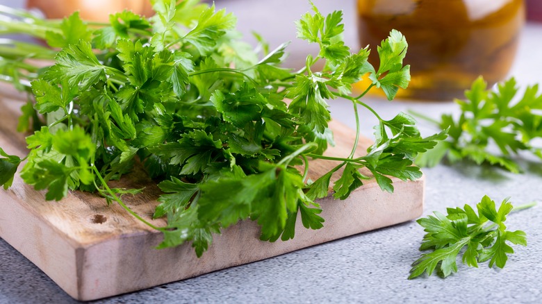 Italian herbs on a cutting board