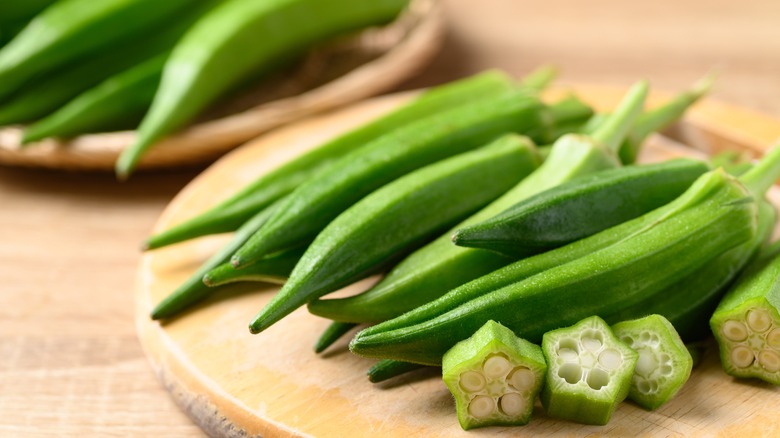 fresh okra on a cutting board