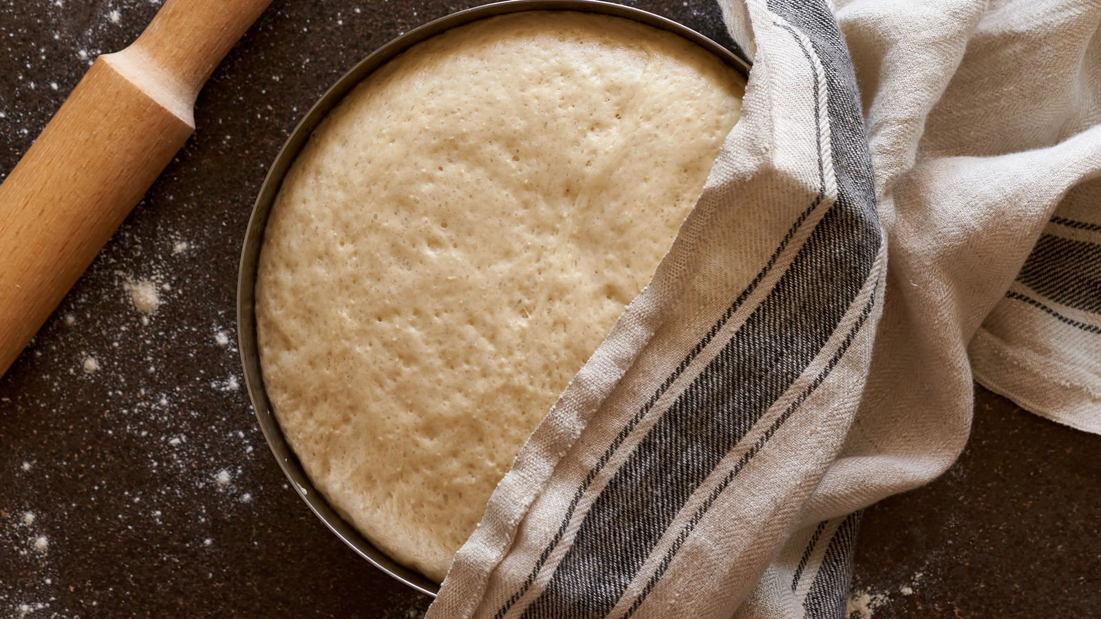 https://www.thedailymeal.com/img/gallery/the-unexpected-solution-for-easily-proofing-bread-in-a-cold-kitchen/l-intro-1678119410.jpg