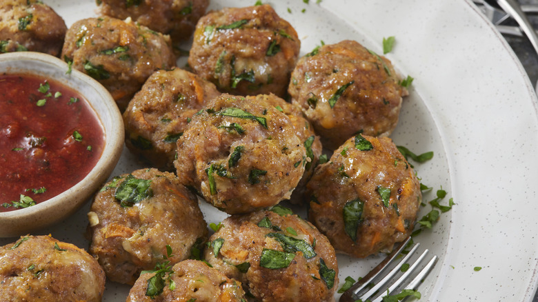 Meatballs with sauce on white plate