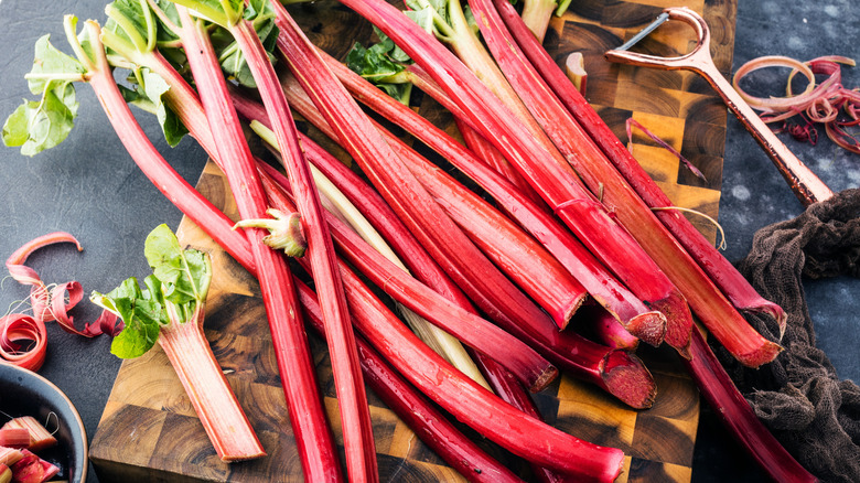 Fresh rhubarb stalks on a cutting board