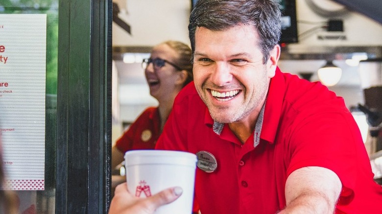 Chick-fil-A employee in drive thru