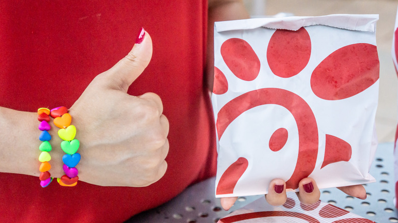 Chick-fil-A employee with rainbow bracelet