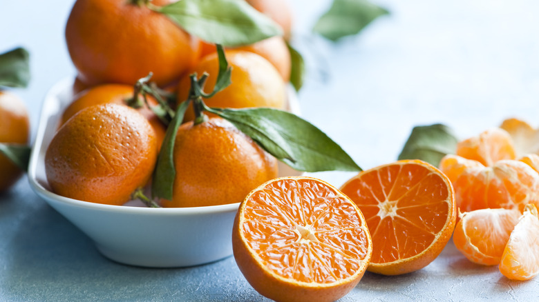 various oranges on table