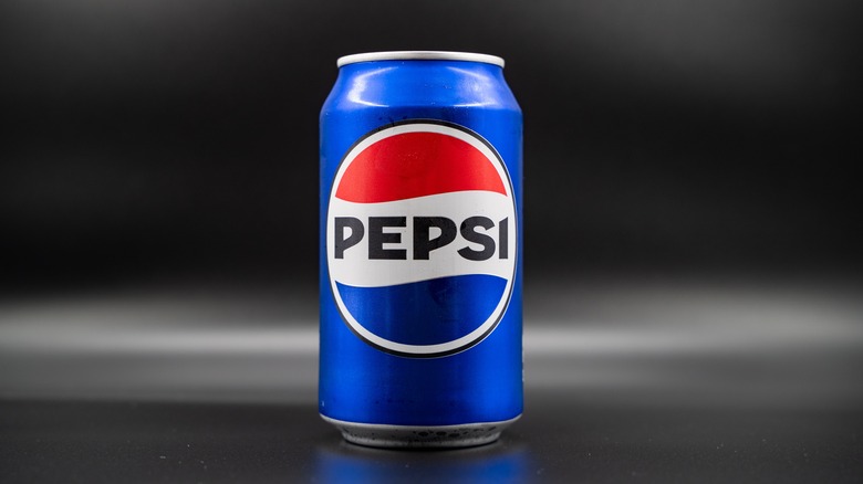 Pepsi can on black background