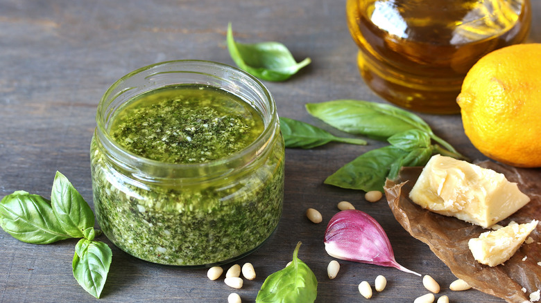 jar of pesto and ingredients