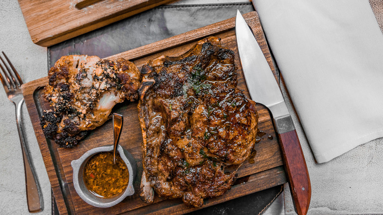 steak with red chimichurri on platter