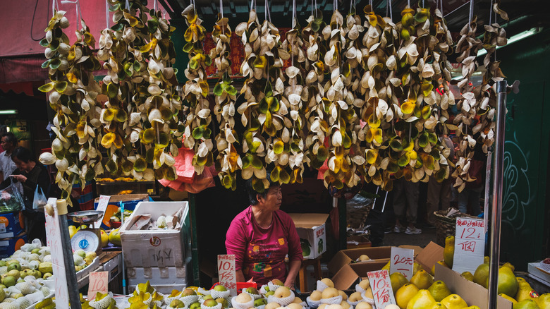 chinese fruit stall drying mandarins