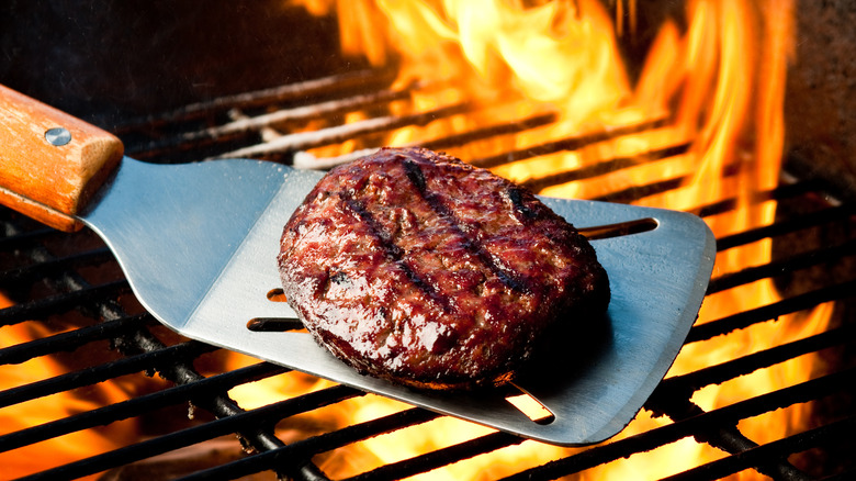 Burger patty on spatula