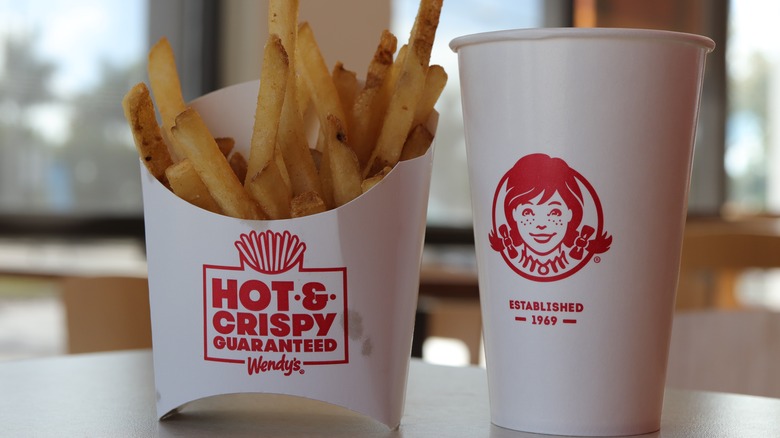 Wendy's fries and beverage on a table