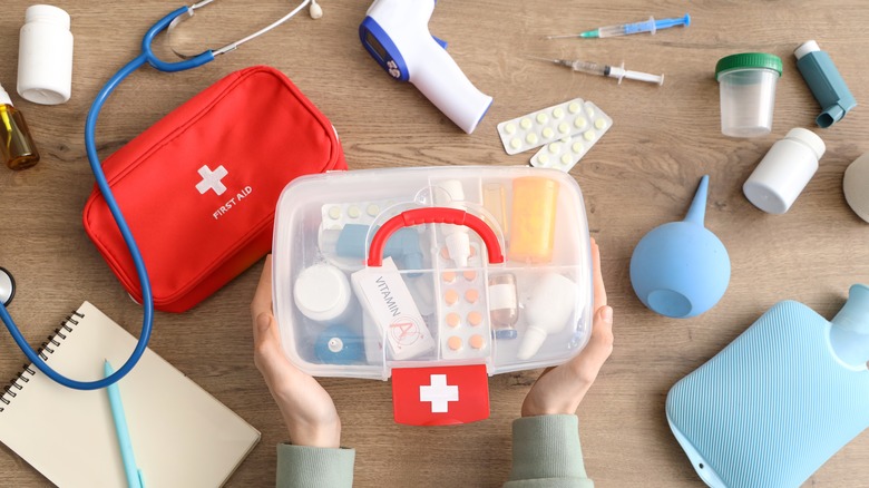 first aid kit on table