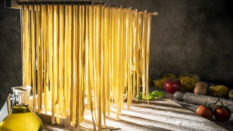 pasta drying on a rack