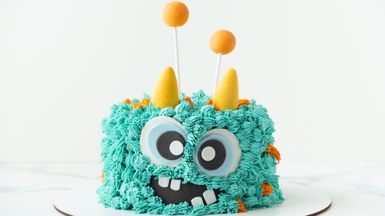 monster fondant and buttercream cake design